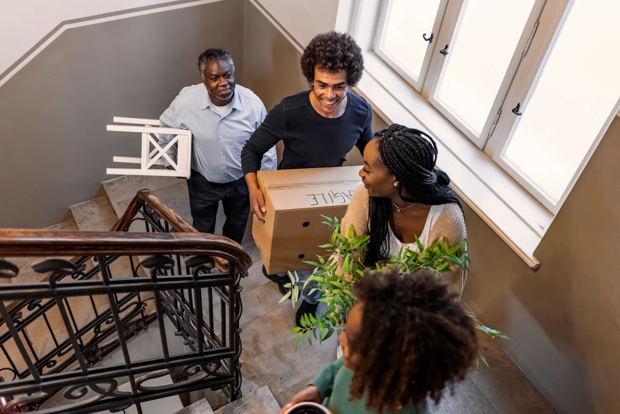 Family packing boxes during a home move