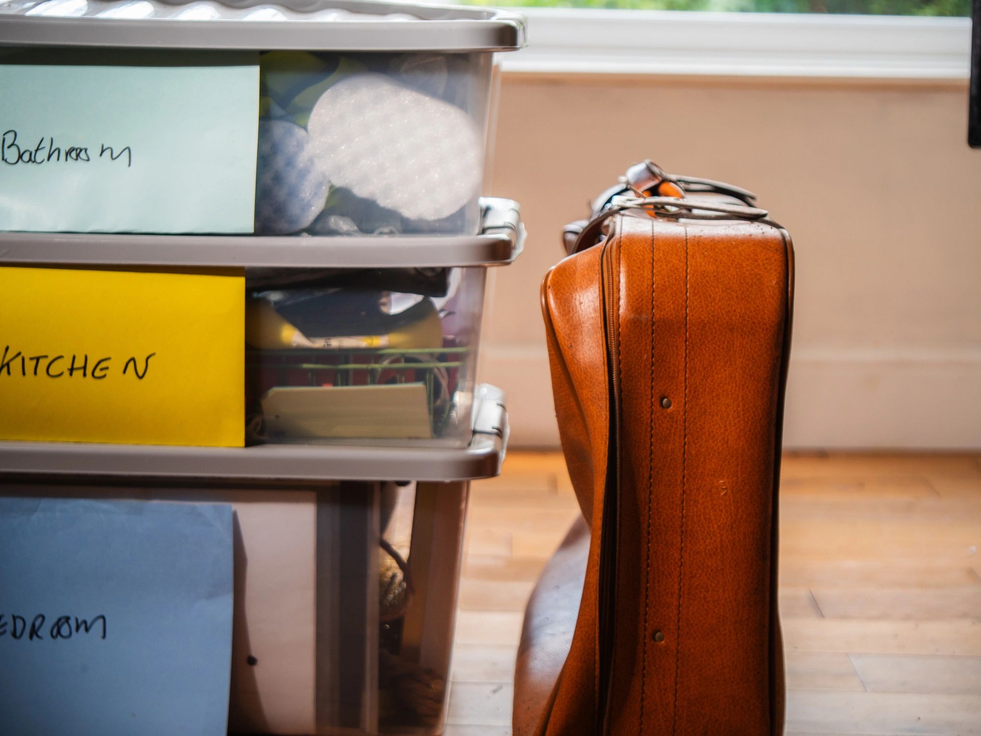 Packed boxes and belongings ready in a new home